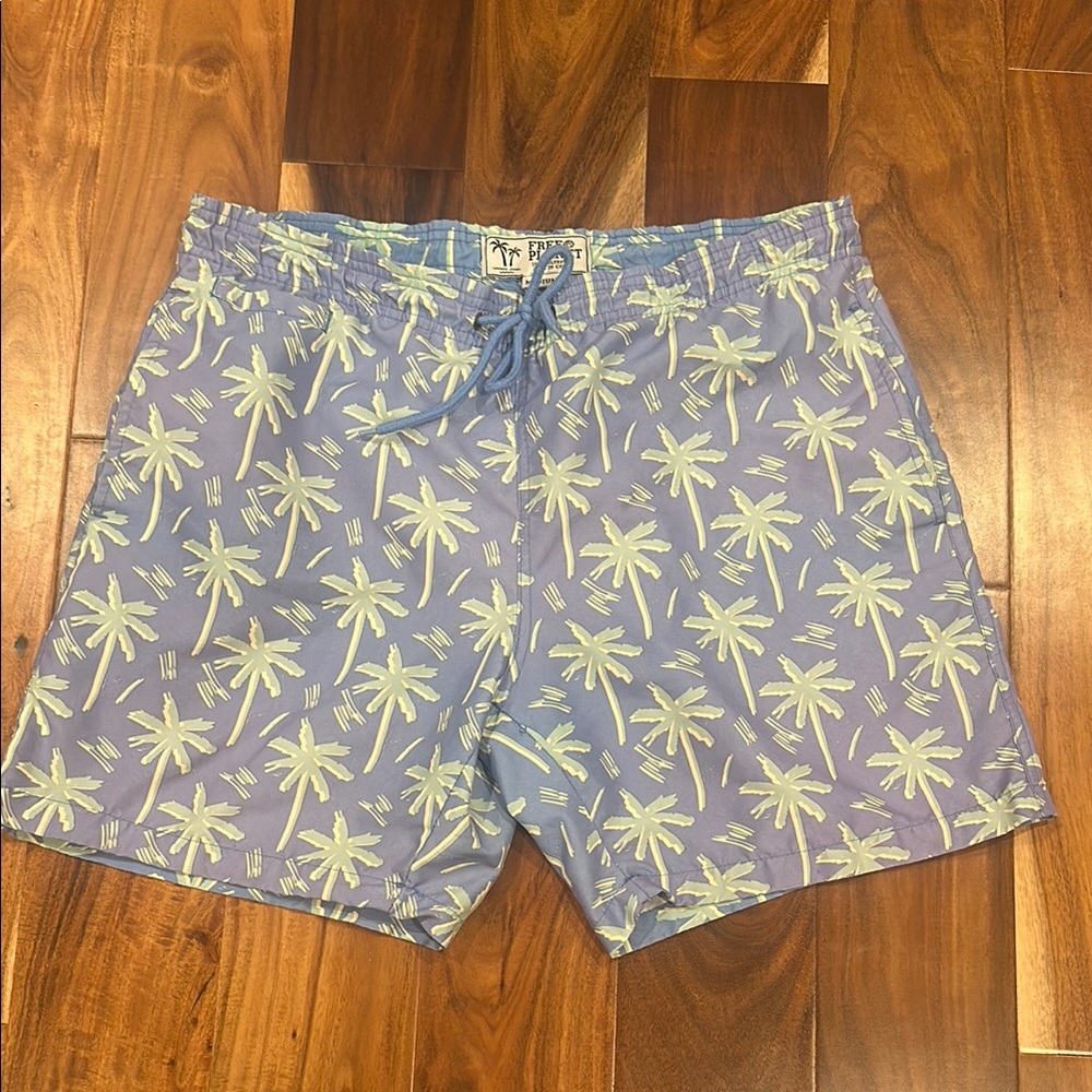Free Planet Blue and Green Swim Trunks Tropical Design